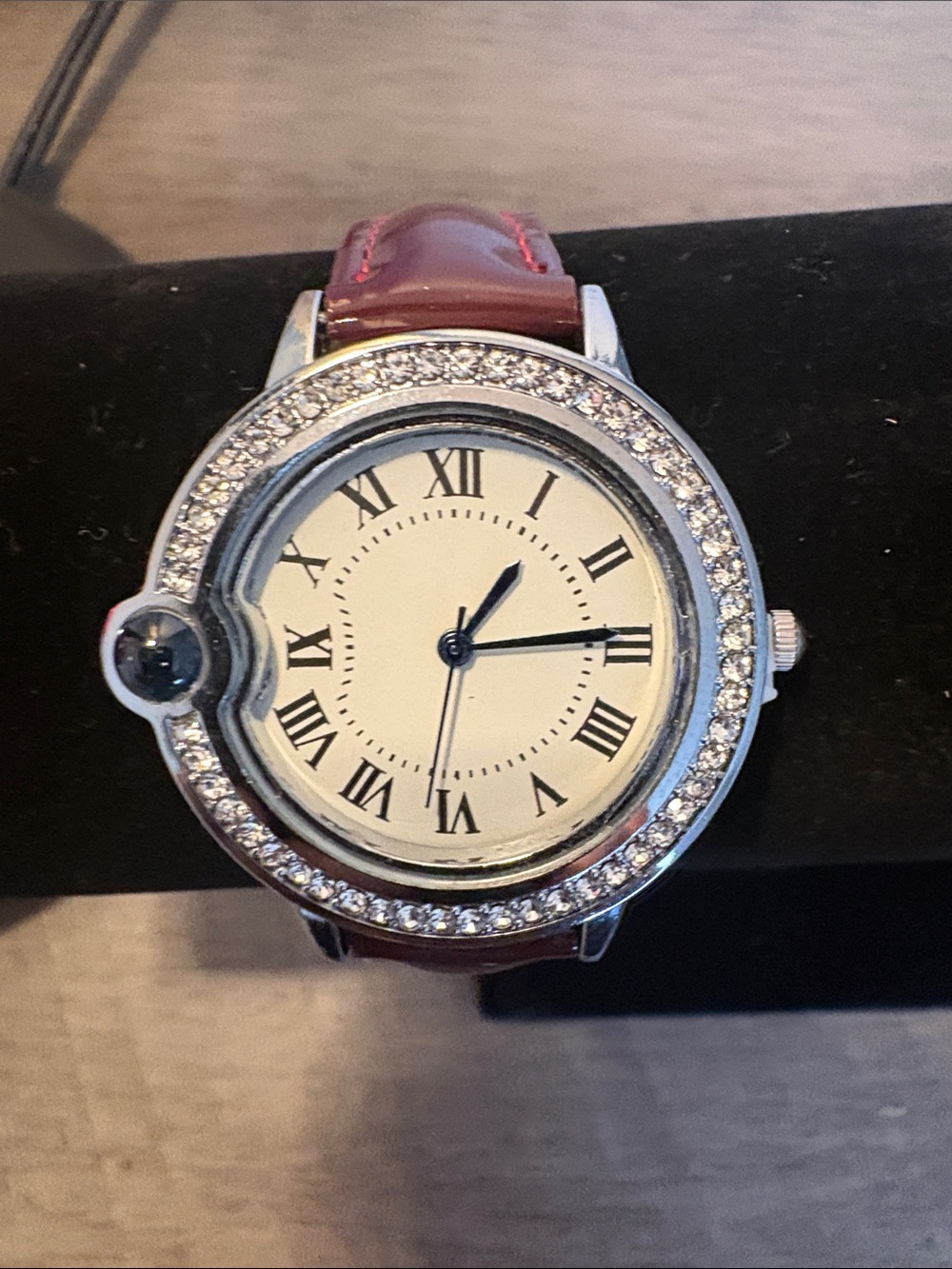 Crystal-Accented Round Watch with Burgundy Leather Strap